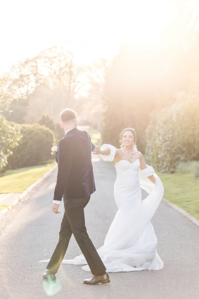 bride and groom dance for golden hour photographs at foxtail barns 