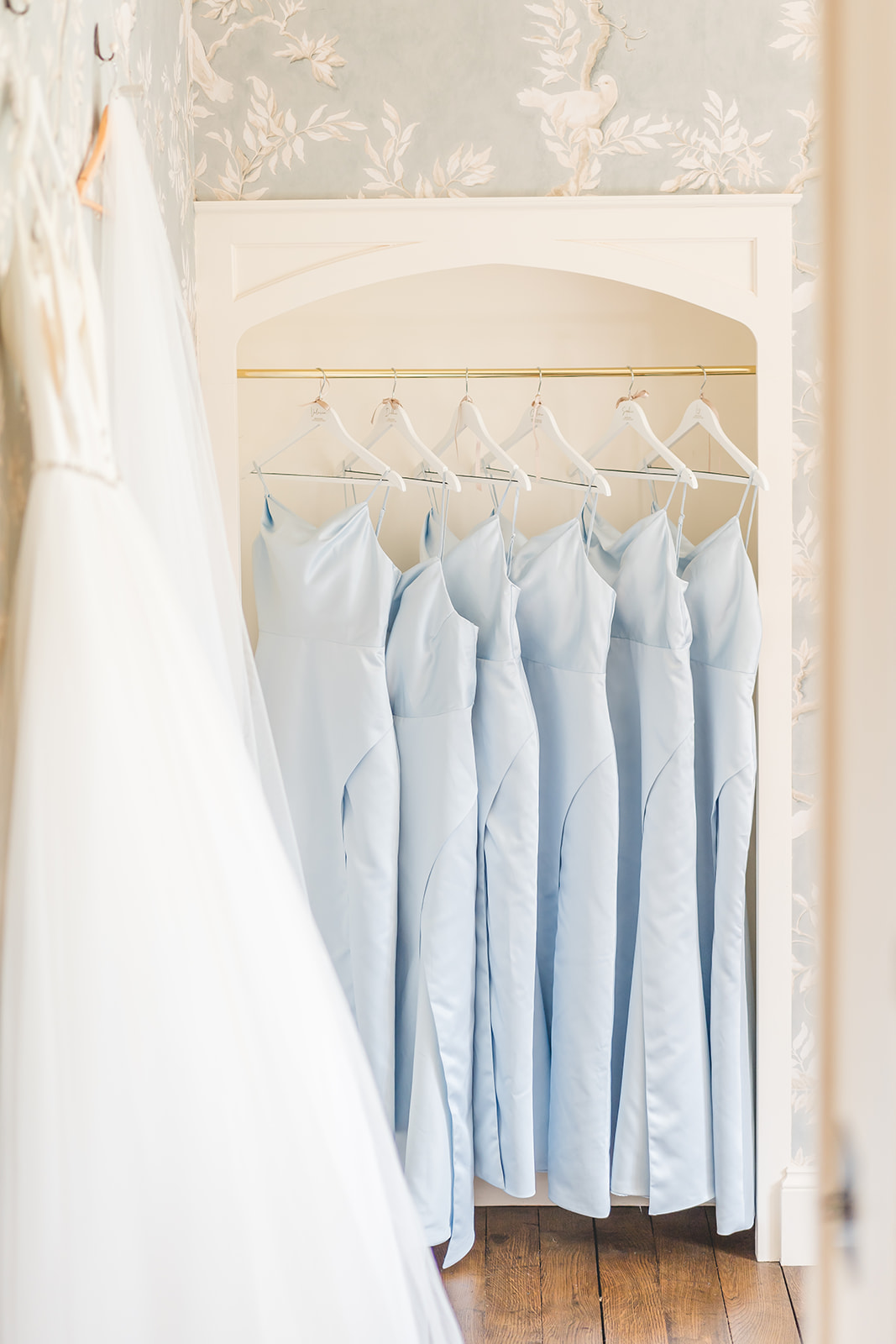 powder blue bridesmaids dresses hang at dorfold hall 