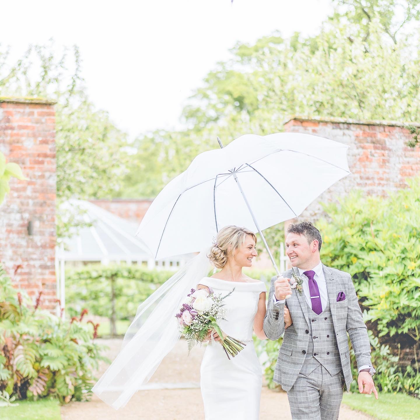 rain on wedding day at Combermere Abbey