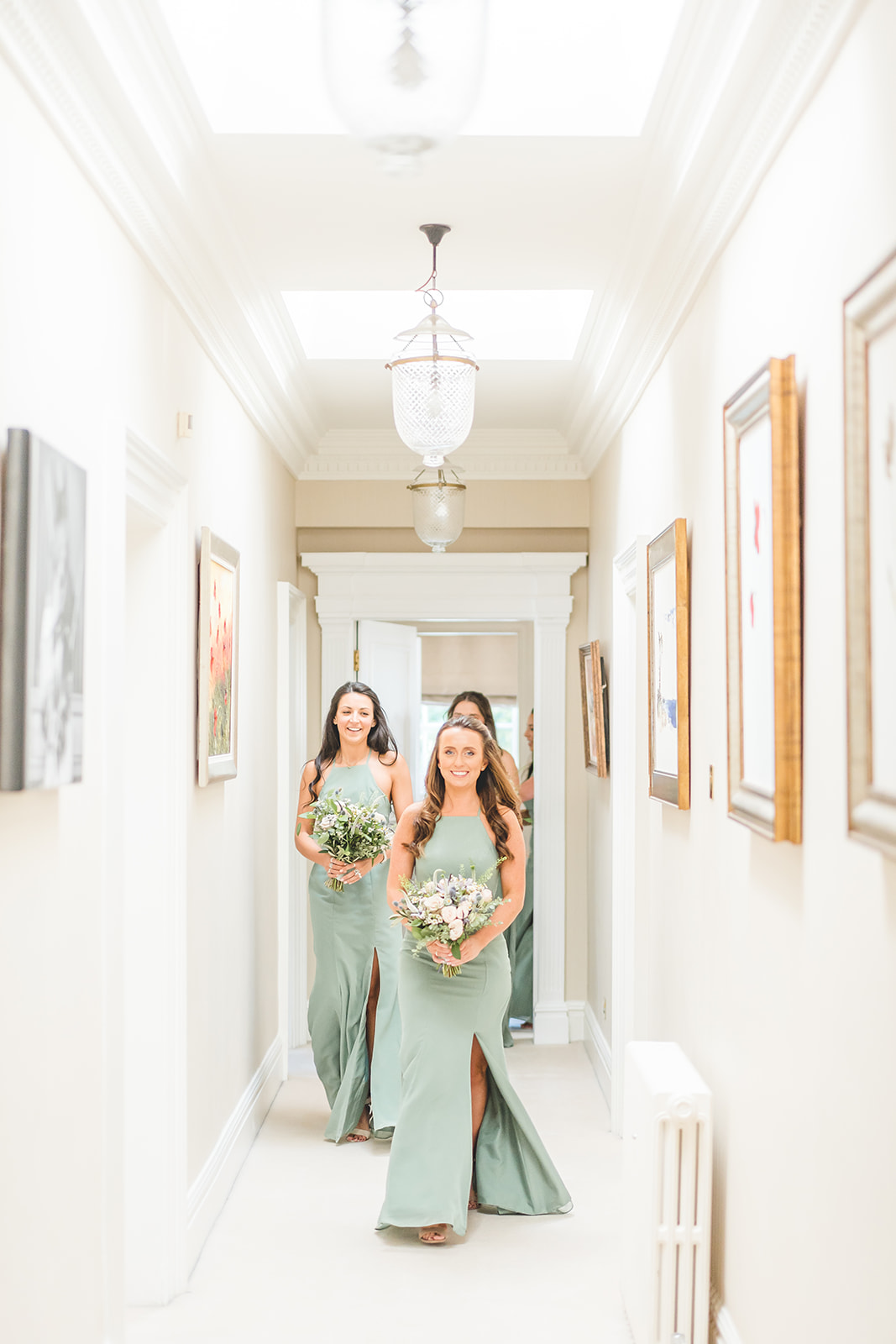 bridesmaids walking at Delamere Manor