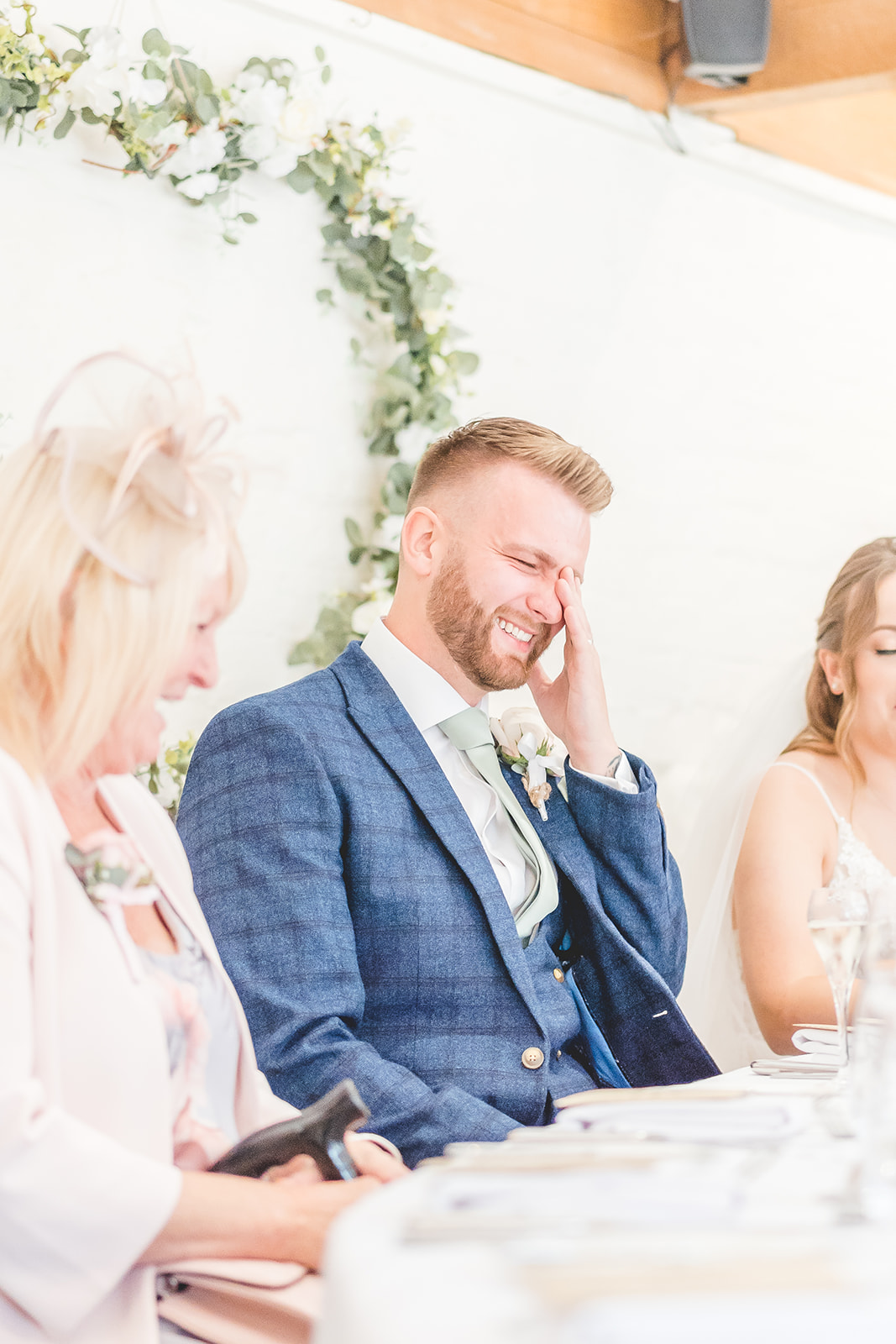groom laughs in speeches 