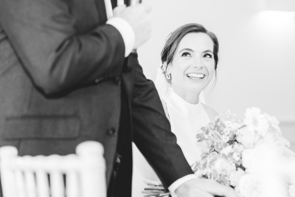bride laughs during speeches 