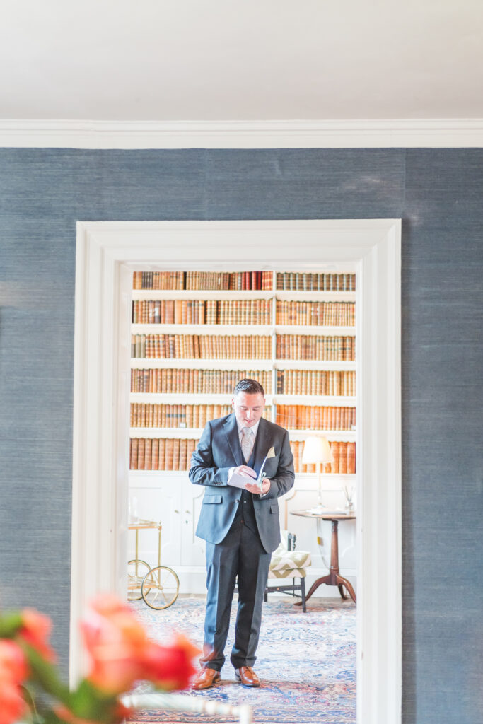 Groom in the library at iscoyd park